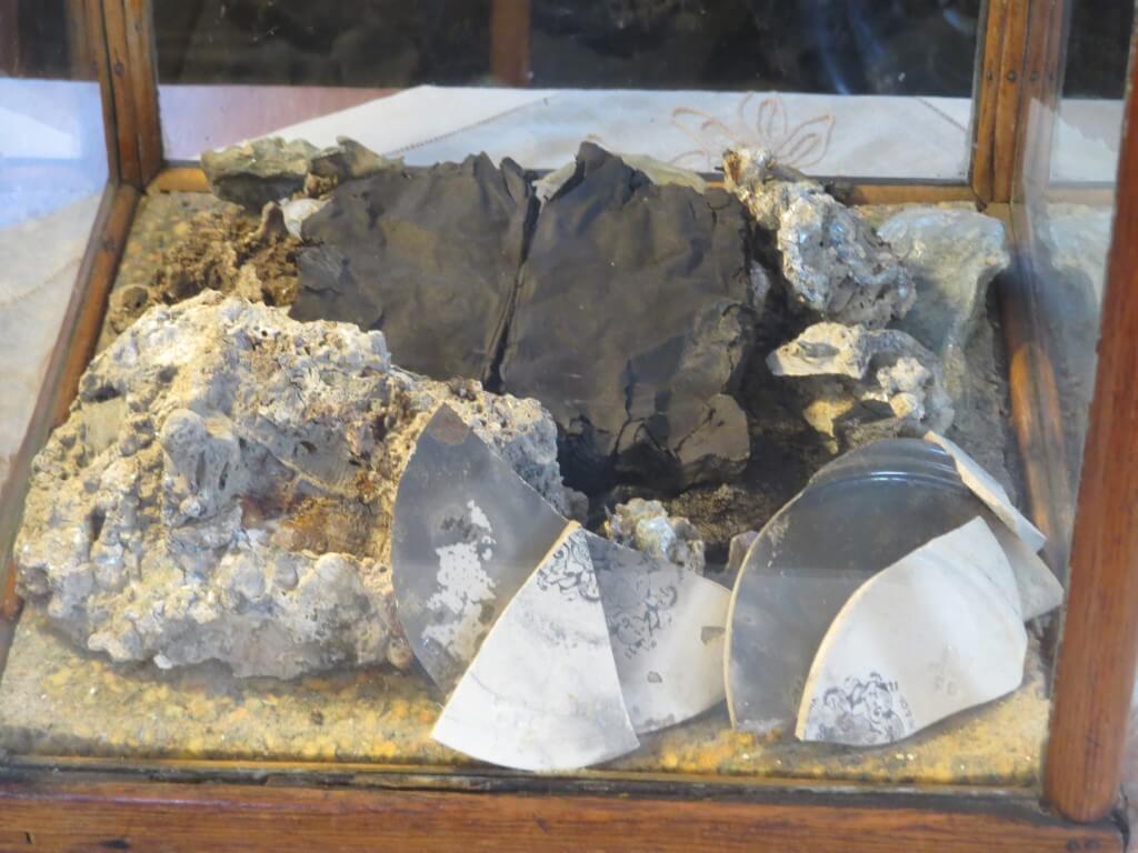 Artifacts from the Great Peshtigo Fire. The blackened object is a Bible.